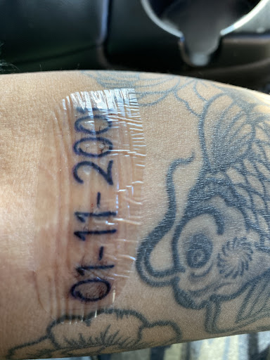 Explore middle finger tattoo ideas, creative tattoo ideas in Jacksonville, available at Fat Kat Tattoo & Body Piercing