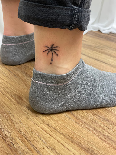 Explore dark cover up tattoo ideas, creative tattoo ideas in Sarasota, available at Diamond Reigns Tattoos