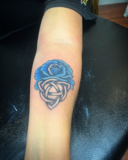 Explore ladies wrist tattoo ideas, creative tattoo ideas in Cocoa, available at Rorschach Tattoo Shop and Piercing Studio