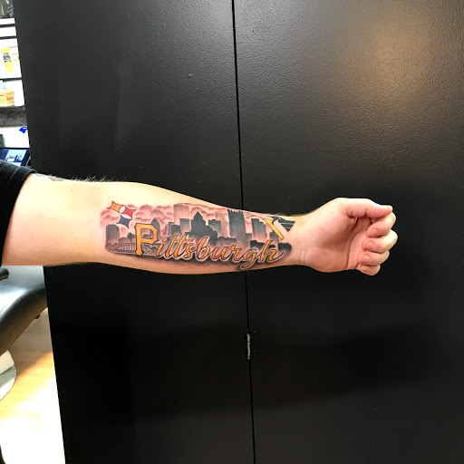 Explore mass effect tattoo ideas, creative tattoo ideas in Tarpon Springs, available at Legendary Custom Tattoos and Piercings