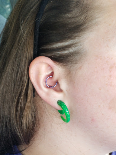 Explore cover up tattoo ideas for upper back, creative tattoo ideas in Savannah, available at Planet 3 Piercing