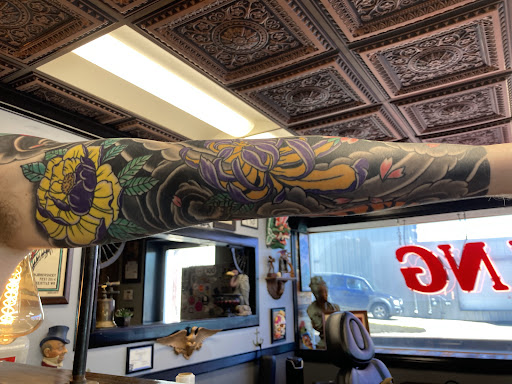 Explore sound wave tattoo ideas, creative tattoo ideas in Lees Summit, available at Bleeding Heart Tattoo