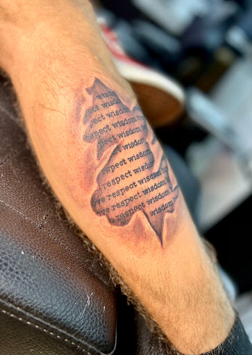 Explore collarbone tattoo ideas for guys, creative tattoo ideas in Cincinnati, available at Artis Inks Tattoo & Piercing - OTR