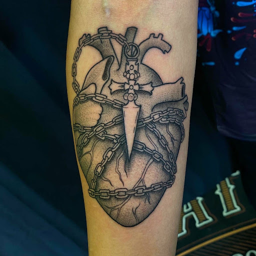 Find western tattoo ideas for your next unique tattoo in Chicago at Mind Crusher Tattoo