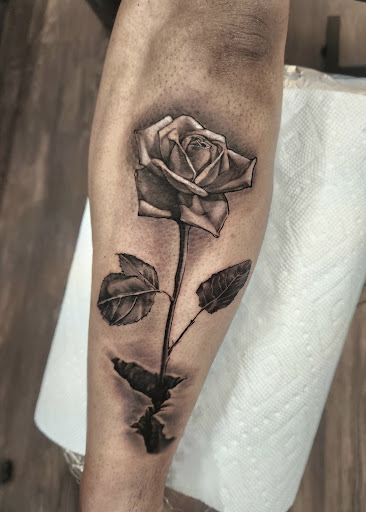 Explore wedding band tattoo ideas for him, creative tattoo ideas in Independence, available at Bare Skin Tattoo