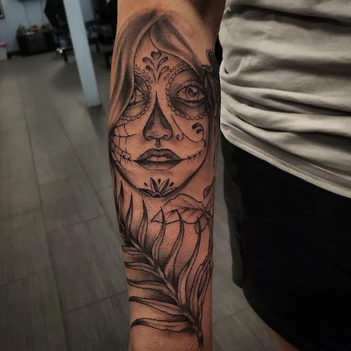 Explore latitude longitude tattoo ideas, creative tattoo ideas in Palm Harbor, available at Angry Owl Tattoo and Piercing