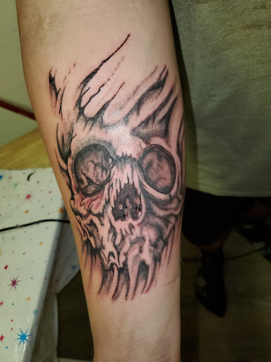 Explore neck tattoo idea, creative tattoo ideas in Inverness, available at The Perfect Spot Tattoos