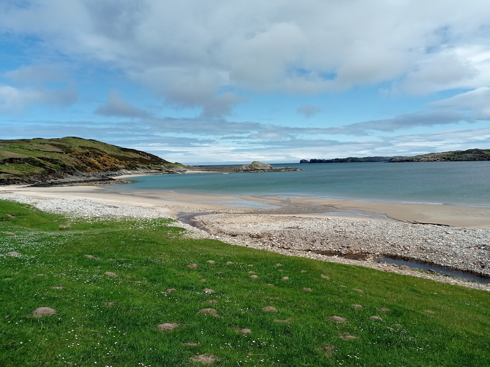 Photo of Talmine Bay with turquoise pure water surface
