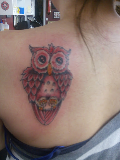 Explore cross cover up tattoo ideas, creative tattoo ideas in Rochester, available at Autonomy Tattoo and Piercing