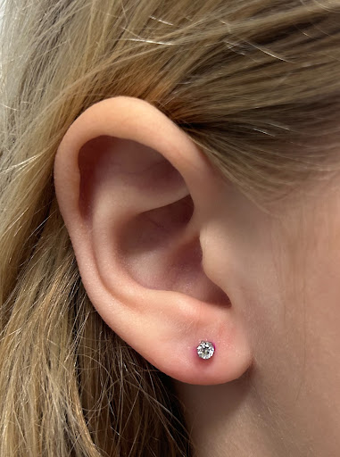 Explore scarlet witch tattoo ideas, creative tattoo ideas in West Chester, available at Piercing by Jacqueline at X-Treme Ink Tattoo