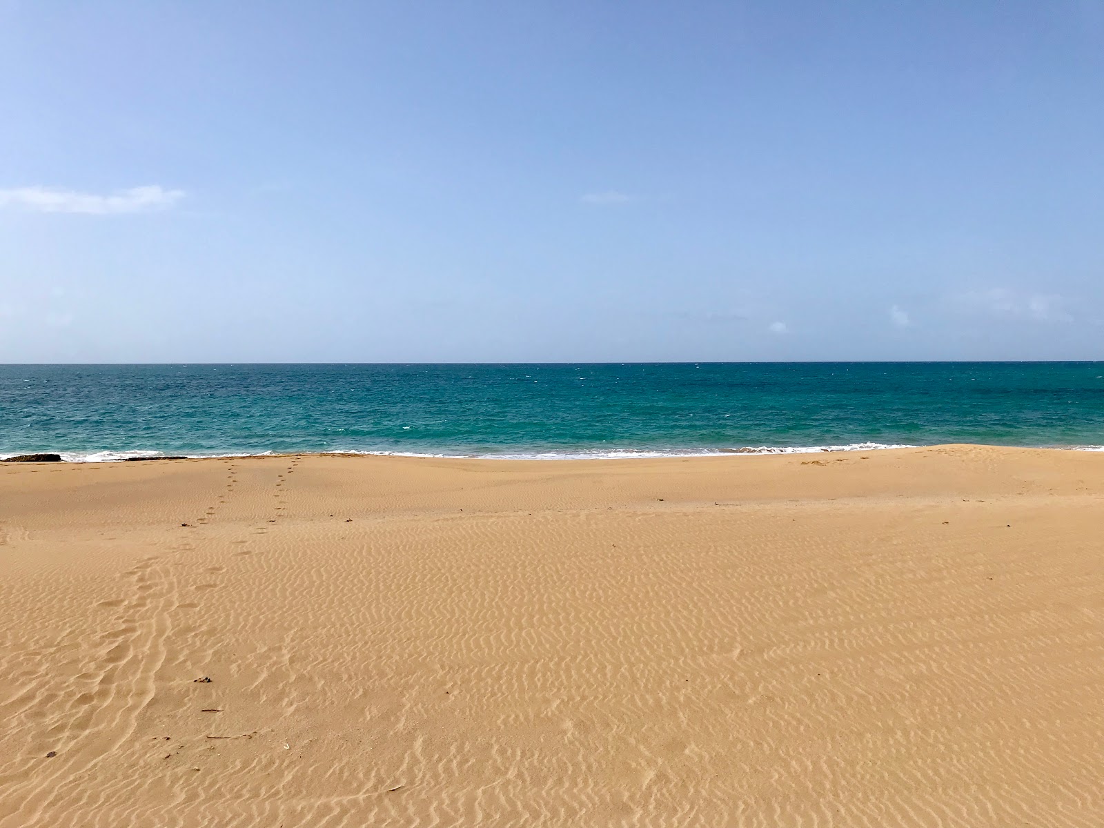 Foto di Se Pasa Bien beach con parzialmente pulito livello di pulizia