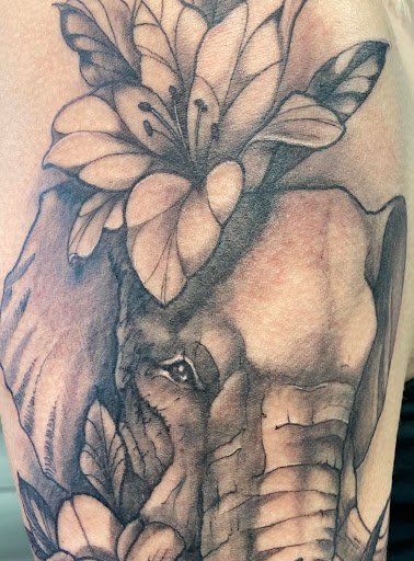 Find leg tattoo ideas for guys for your next unique tattoo in Largo at Alchemy Tattoos and Body Piercings