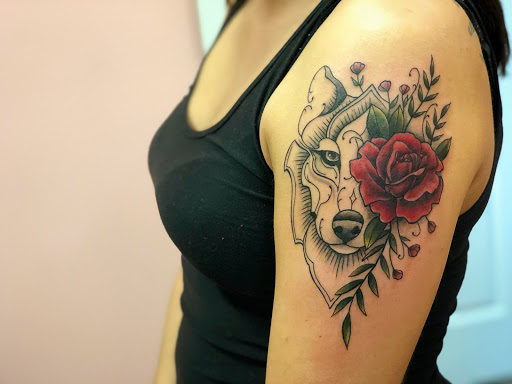 Explore motorbike tattoo ideas, creative tattoo ideas in Batavia, available at The Pretty Pin-Up Tattoo Parlor