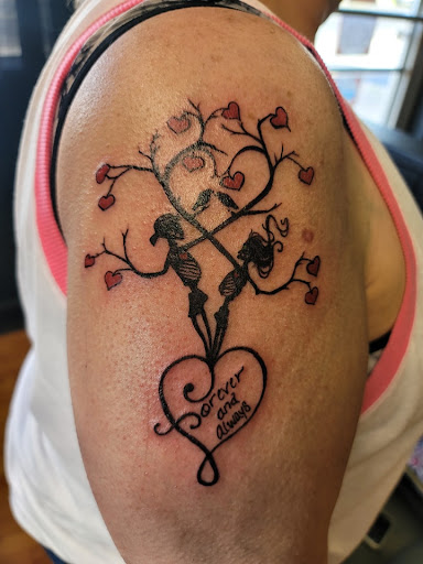 Explore matching tattoos for father and son ideas, creative tattoo ideas in York, available at York Ink Tattoos and Body Piercing