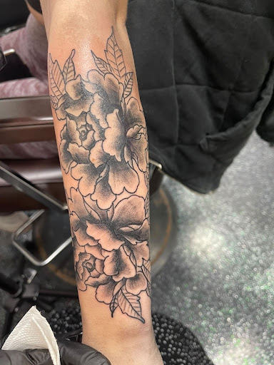 Explore themed sleeve tattoo ideas, creative tattoo ideas in Slippery Rock, available at Dinky Dachshund Tattoo Parlor