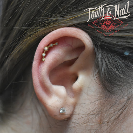 Explore men tattoo sleeve ideas, creative tattoo ideas in Davenport, available at Tooth & Nail Tattoo & Piercing