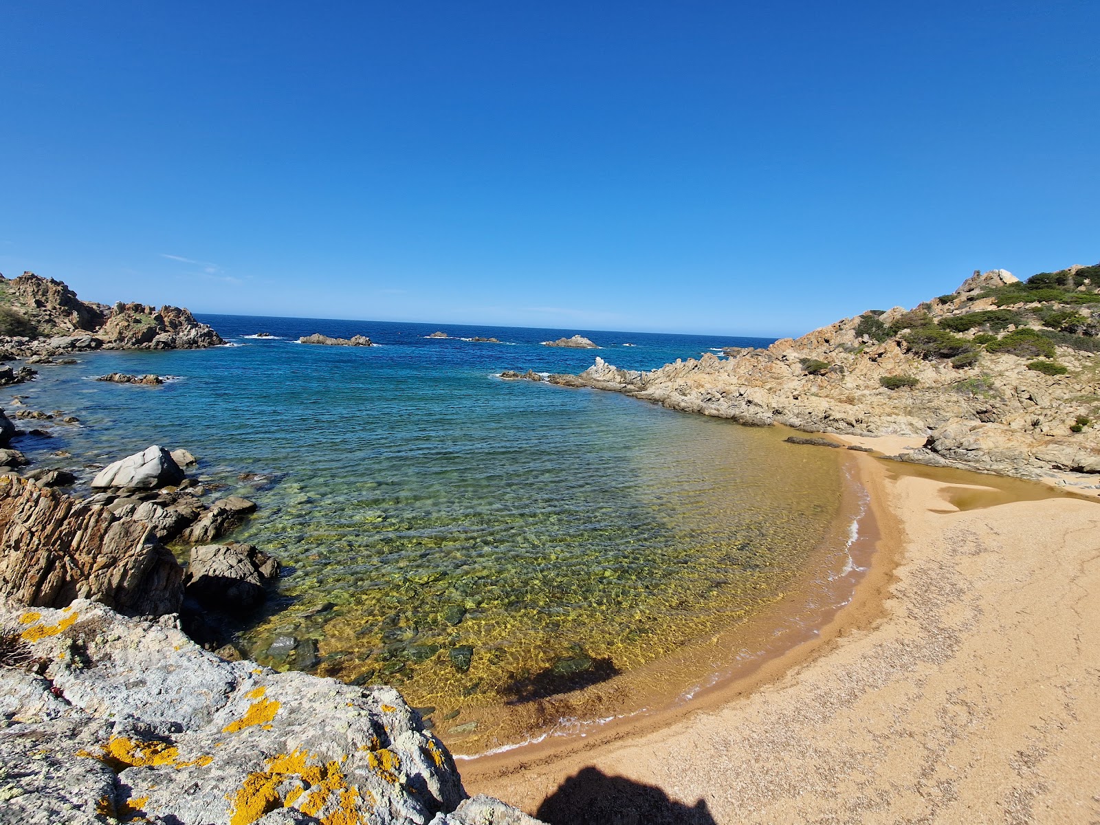 Photo of Spiaggia di Cala Faa with very clean level of cleanliness