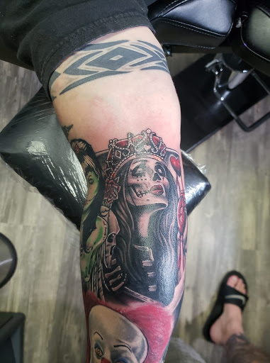 Explore cover up tattoo ideas lower back, creative tattoo ideas in Athens, available at United Ink Tattoos and Body Piercings