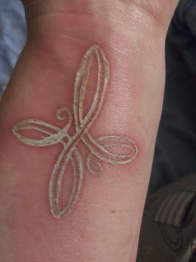 Find jack skellington tattoo ideas for your next unique tattoo in Des Moines at Expo Piercing Ink