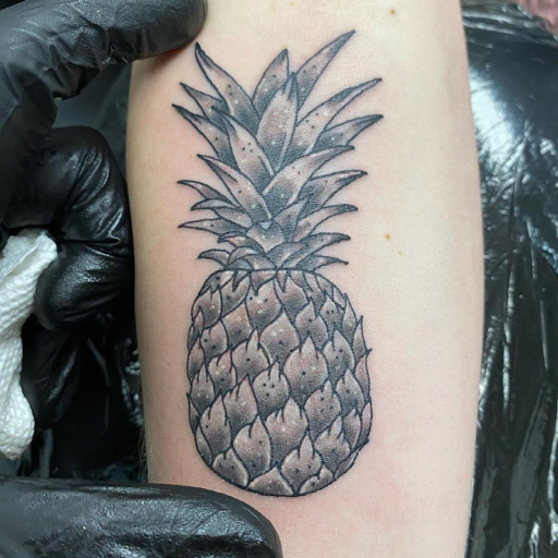 Explore curly hair tattoo ideas, creative tattoo ideas in Myrtle Beach, available at Myrtle Beach Ink