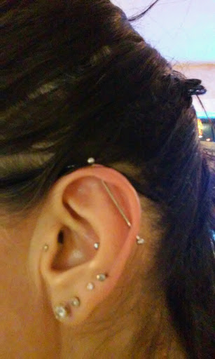 Explore women's lower back tattoo ideas, creative tattoo ideas in Tucson, available at Sacred Art Tattoo Studio