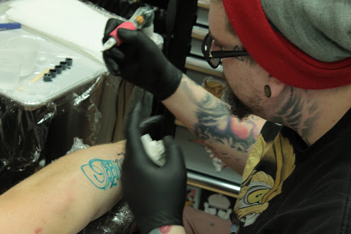 Explore small number tattoo ideas, creative tattoo ideas in Dubuque, available at The Crows Nest