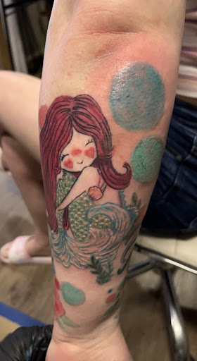 Explore concert tattoo ideas, creative tattoo ideas in Sunbury, available at Spot of Ink