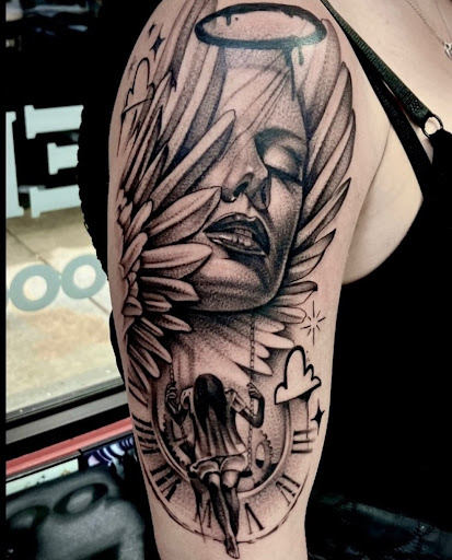 Explore tattoo ideas breast cancer ribbon, creative tattoo ideas in Millsboro, available at Tattoo Galaxy (Millsboro) Piercing & Custom tattoos