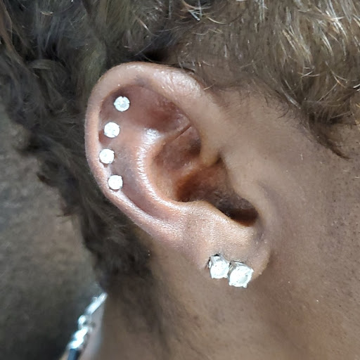 Tattoo Shop «Skin of A Different Color», reviews and photos, 2080 E New York St, Aurora, IL 60502, USA