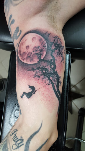 Explore hood tattoo ideas, creative tattoo ideas in Warren, available at Dark Horse Tattoo Co. LLC.