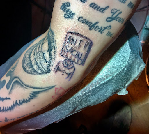 Explore cosmic tattoo ideas, creative tattoo ideas in Watertown, available at Wonderland Ink Factory Tattoos and Piercing