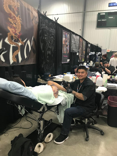 Explore female big tattoo ideas, creative tattoo ideas in Fargo, available at Golden Dragon Tattoo