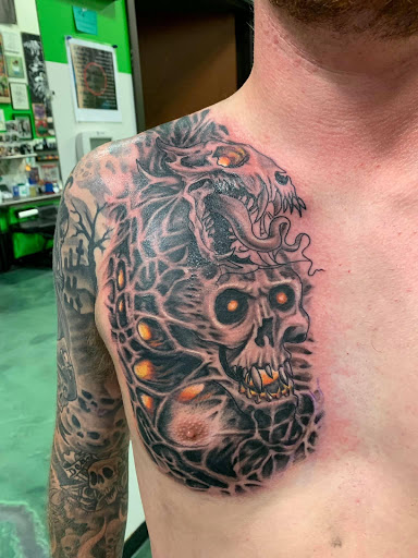 Explore men basketball tattoo ideas, creative tattoo ideas in Roanoke, available at Saint Cecilias Art Studio