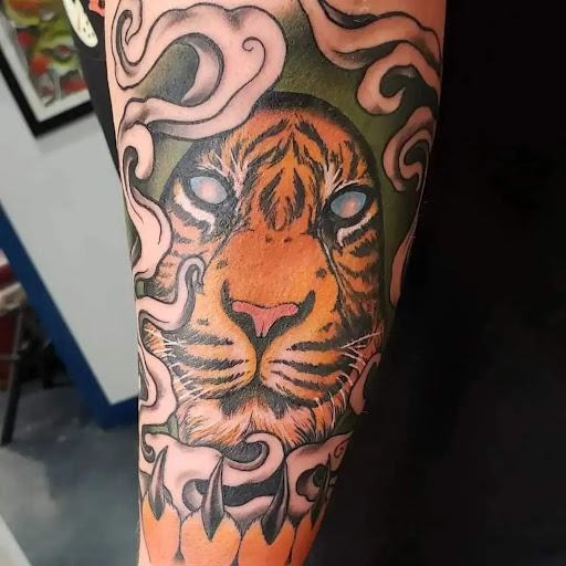 Explore great half sleeve tattoo ideas, creative tattoo ideas in Albuquerque, available at Tiger Wraith Tattoo
