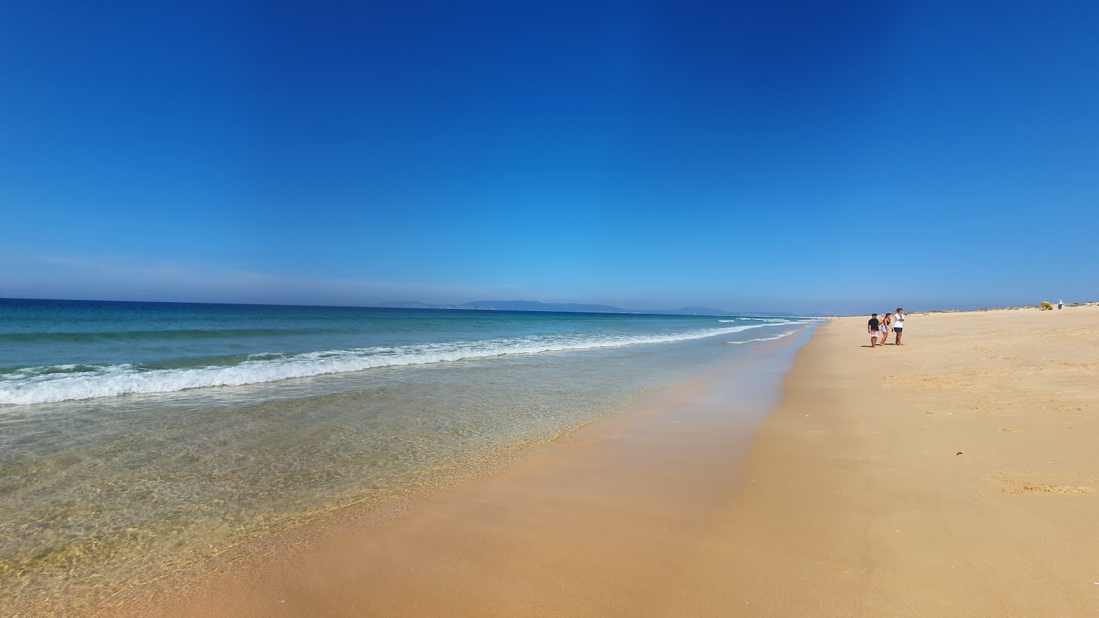 Foto von Comporta Strand mit langer gerader strand