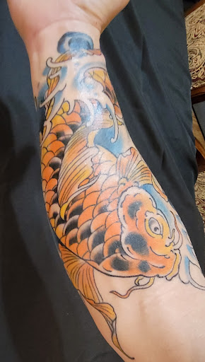 Explore wild tattoo ideas, creative tattoo ideas in Powell, available at Tattoo Saga