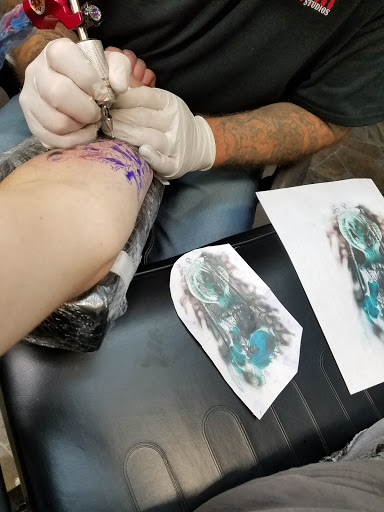 Explore son and daughter tattoo ideas, creative tattoo ideas in Hays, available at Fantasy Graphics Tattoo Studios