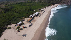 Foto di Spiaggia di Canalan con costa lunga e dritta
