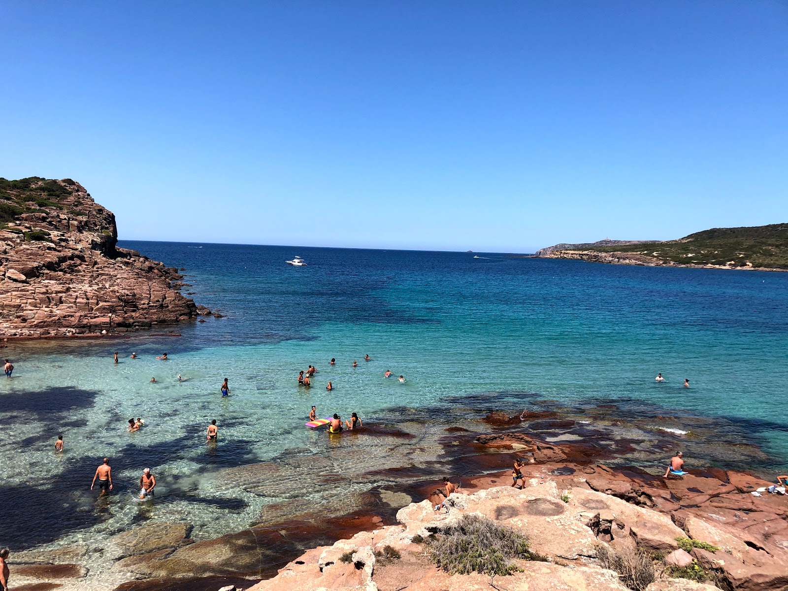 Foto de La Caletta con agua cristalina superficie