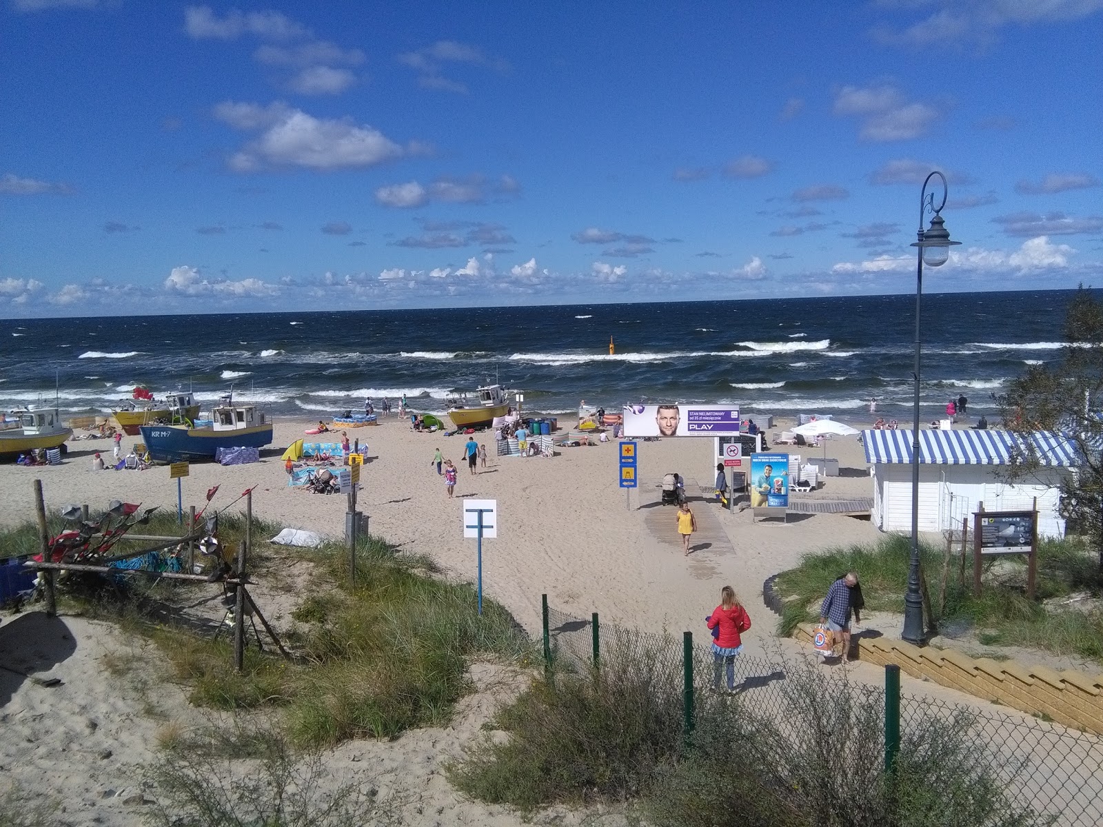 Foto von Beach at the Fishing Port - beliebter Ort unter Entspannungskennern