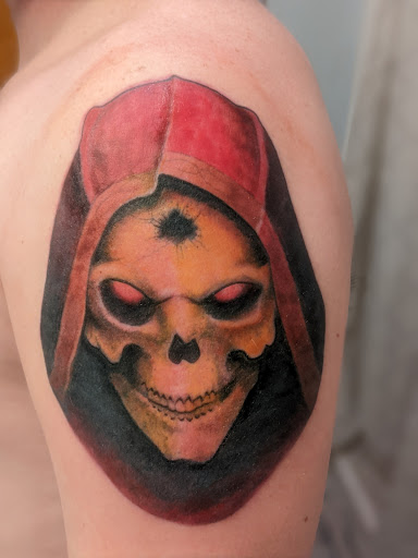 Explore voodoo doll tattoo ideas, creative tattoo ideas in Erie, available at Ink Assassins