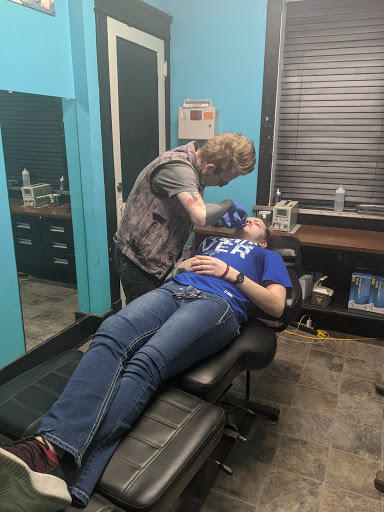 Explore cool leg tattoo ideas for guys, creative tattoo ideas in Council Bluffs, available at Lil Bros Tattoo