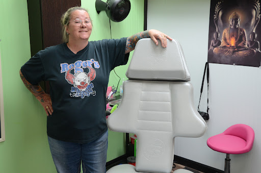 Explore name cover up tattoo ideas for men, creative tattoo ideas in Bradley, available at Rogers Tattooing & Body Piercing