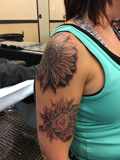 Explore star sleeve tattoo ideas, creative tattoo ideas in Peoria, available at Iron Key Tattoo Studio Inc.