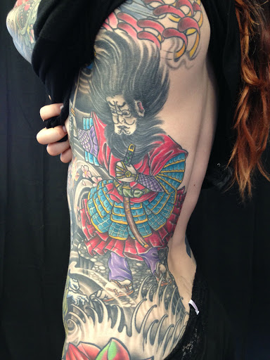 Explore chest piece tattoo ideas woman, creative tattoo ideas in Peoria, available at Iron Key Tattoo Studio Inc.