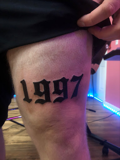 Explore fine line name tattoo ideas, creative tattoo ideas in North Tonawanda, available at Dark Side Ink Tattoo Studio