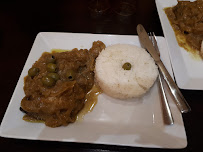 Poulet au curry du Restaurant de spécialités d'Afrique de l'Ouest Afrik'N'Fusion à Paris - n°11