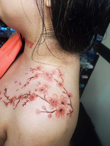 Find tattoo ideas between breast for your next unique tattoo in Bronx at Living Legends Ink realistic tattoos