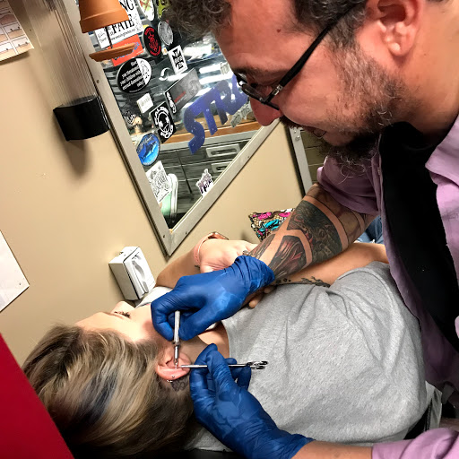 Explore tiny hummingbird tattoo ideas, creative tattoo ideas in Augusta, available at Mr. Tattoo