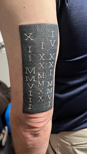 Explore clock hand tattoo ideas, creative tattoo ideas in Wylie, available at Wylie Tattoo Parlor Alterity Collectors Union